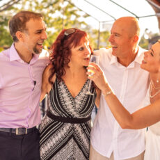 The bride, groom, and friends enjoy the rooftop wedding ceremony and wedding reception space at La Sirena Puerto Morelos. Cheers to the new Mr. and Mrs. at La Sirena Puerto Morelos.