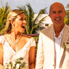 Newlyweds share a moment of levity on the rooftop at La Sirena Puerto Morelos.