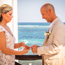 Bride and Groom during their wedding ceremony at La Sirena Puerto Morelos, organized by Let's Marry in Mexico.