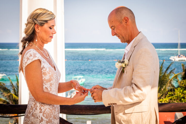 Bride and Groom during their wedding ceremony at La Sirena Puerto Morelos, organized by Let's Marry in Mexico.
