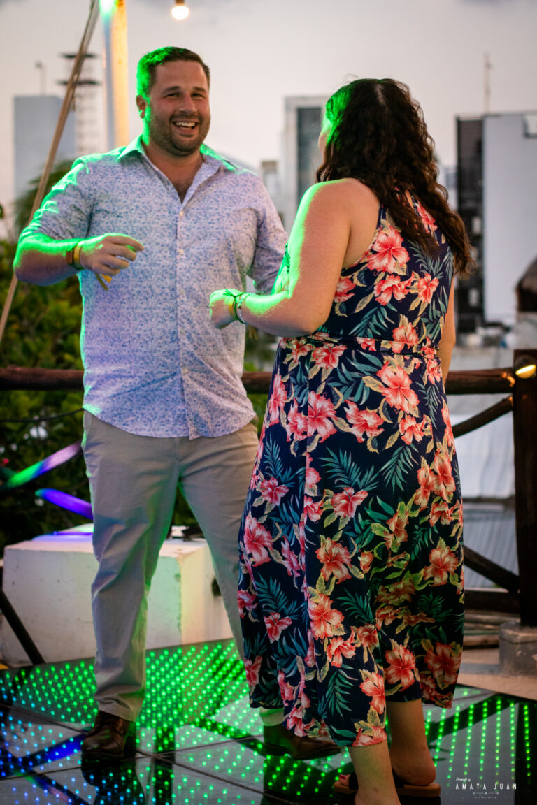 A man and woman dance on the LED dance floor at La Sirena Puerto Morelos.